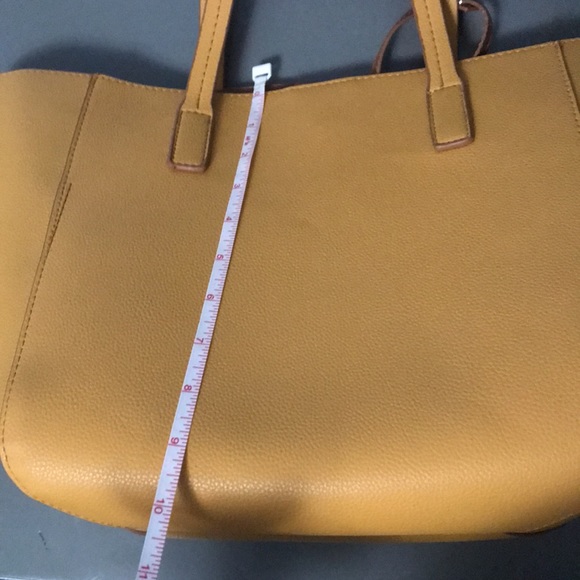 Tommy Bahama Reversible Faux Leather Tote Wristlet - Picture 16 of 16